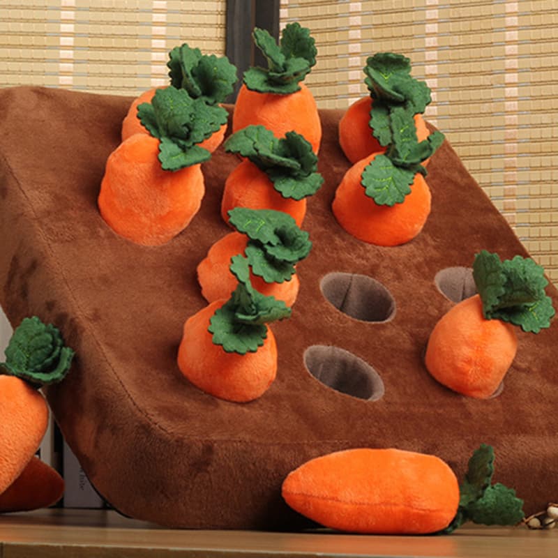 Carrot Field Snuffle Toy on a table with some carrots pulled out